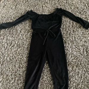 Brand new velvet black jumpsuit from Fashion Nova